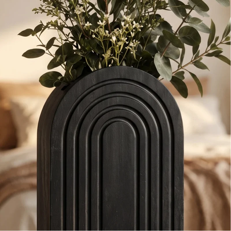 Black wood vase styled in a warm home setting - 2