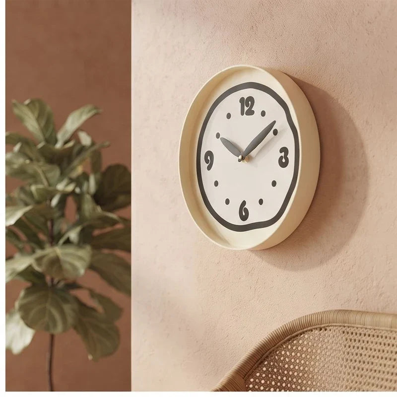 Black clock styled in a warm home setting - 2