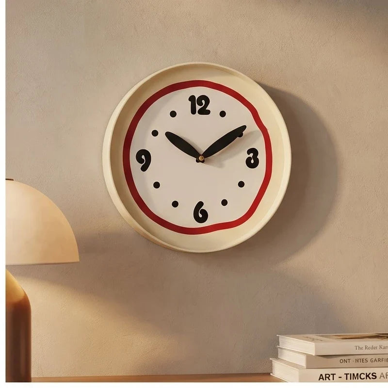 Red clock styled in a warm home setting - 2