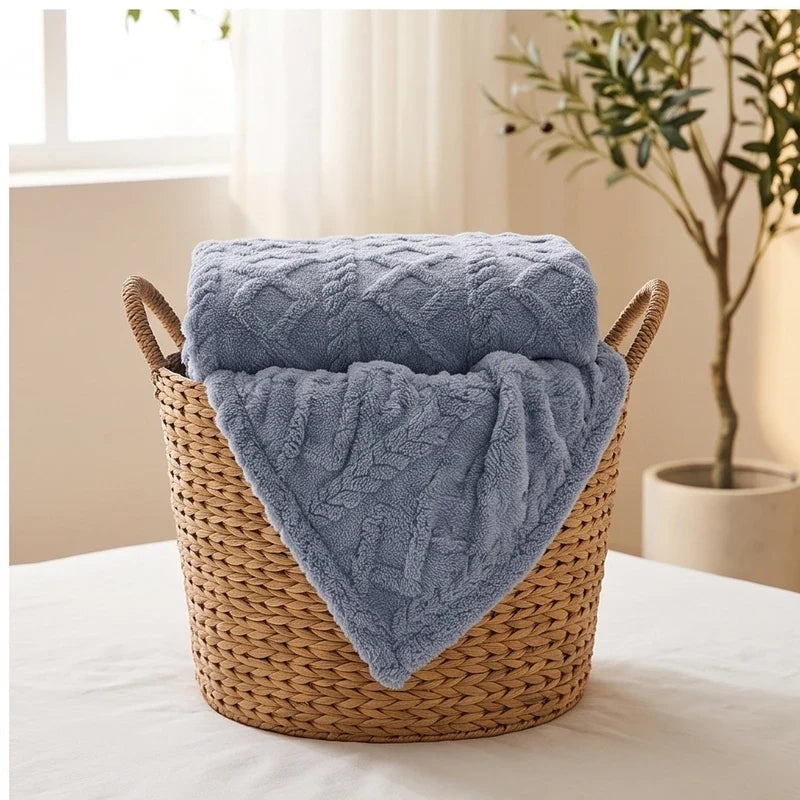 Blue fleece throw styled in a warm home setting - 3